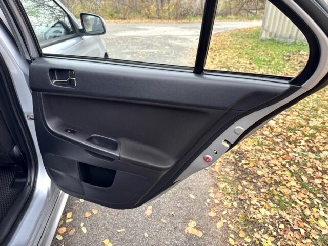 Серый Мицубиси Лансер, объемом двигателя 2 л и пробегом 225 тыс. км за 6890 $, фото 14 на Automoto.ua