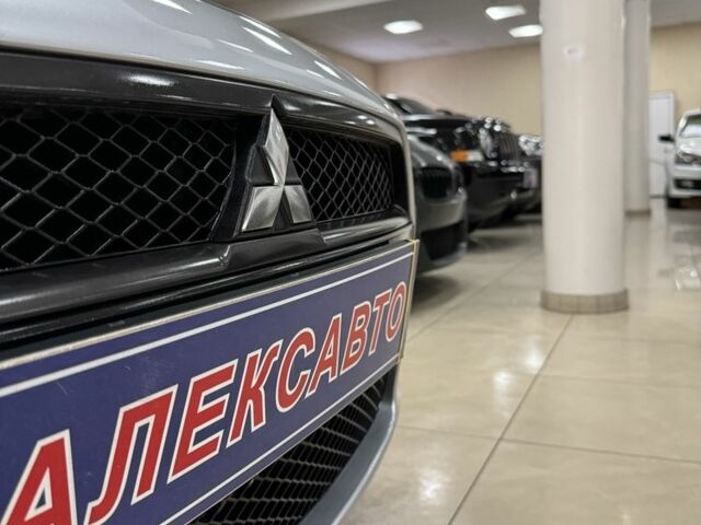 Серый Мицубиси Лансер, объемом двигателя 2 л и пробегом 172 тыс. км за 6300 $, фото 1 на Automoto.ua