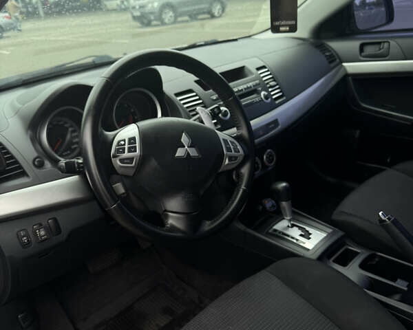 Сірий Міцубісі Lancer, об'ємом двигуна 2 л та пробігом 185 тис. км за 7000 $, фото 11 на Automoto.ua