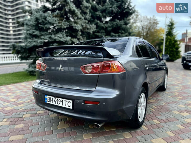 Серый Мицубиси Лансер, объемом двигателя 2 л и пробегом 212 тыс. км за 6000 $, фото 10 на Automoto.ua