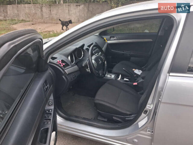 Сірий Міцубісі Lancer, об'ємом двигуна 1.8 л та пробігом 255 тис. км за 6999 $, фото 6 на Automoto.ua