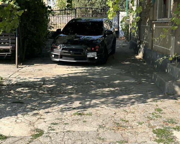 Серый Мицубиси Лансер, объемом двигателя 1.5 л и пробегом 255 тыс. км за 8000 $, фото 6 на Automoto.ua
