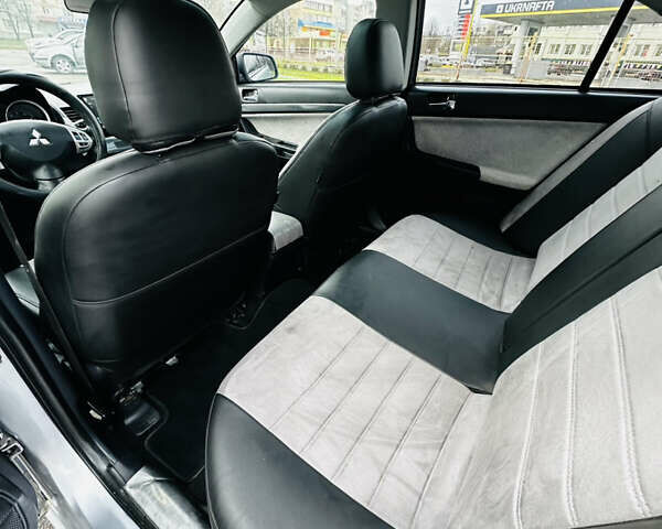 Сірий Міцубісі Lancer, об'ємом двигуна 2 л та пробігом 238 тис. км за 5350 $, фото 16 на Automoto.ua