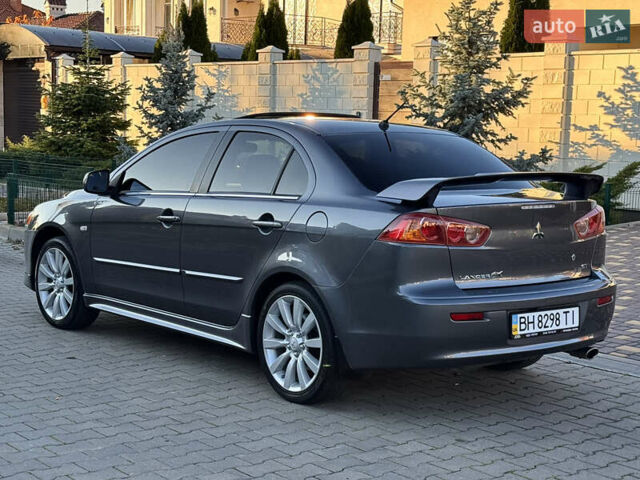 Сірий Міцубісі Lancer, об'ємом двигуна 2 л та пробігом 92 тис. км за 9800 $, фото 29 на Automoto.ua