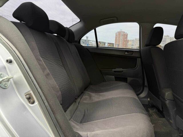 Сірий Міцубісі Lancer, об'ємом двигуна 1.5 л та пробігом 233 тис. км за 5890 $, фото 10 на Automoto.ua