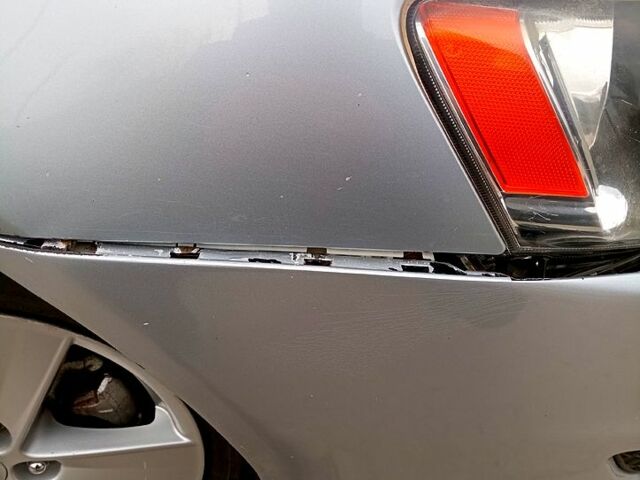 Серый Мицубиси Лансер, объемом двигателя 2 л и пробегом 243 тыс. км за 5500 $, фото 5 на Automoto.ua