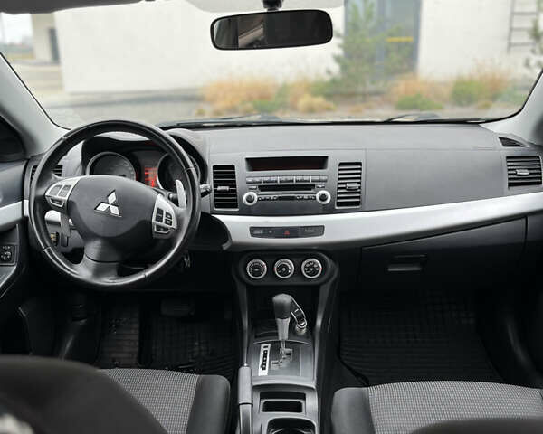 Сірий Міцубісі Lancer, об'ємом двигуна 2 л та пробігом 230 тис. км за 6800 $, фото 28 на Automoto.ua