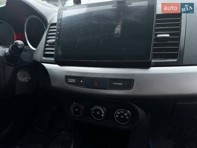 Серый Мицубиси Лансер, объемом двигателя 1.5 л и пробегом 147 тыс. км за 6700 $, фото 17 на Automoto.ua