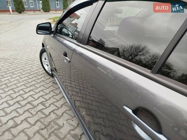 Міцубісі Lancer 2008 у Хмельницькому на Automoto.ua Сірий Міцубісі Lancer, об'ємом двигуна 2 л та пробігом 157 тис. км за 6300 $, фото 58 на Automoto.ua