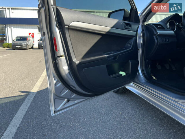Сірий Міцубісі Lancer, об'ємом двигуна 2 л та пробігом 237 тис. км за 7200 $, фото 35 на Automoto.ua