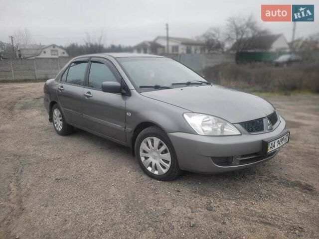 Сірий Міцубісі Lancer, об'ємом двигуна 1.6 л та пробігом 440 тис. км за 4200 $, фото 1 на Automoto.ua