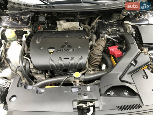 Сірий Міцубісі Lancer, об'ємом двигуна 2 л та пробігом 187 тис. км за 8000 $, фото 18 на Automoto.ua