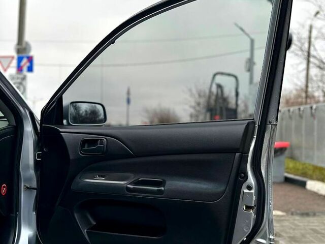 Серый Мицубиси Лансер, объемом двигателя 1.6 л и пробегом 165 тыс. км за 4000 $, фото 7 на Automoto.ua