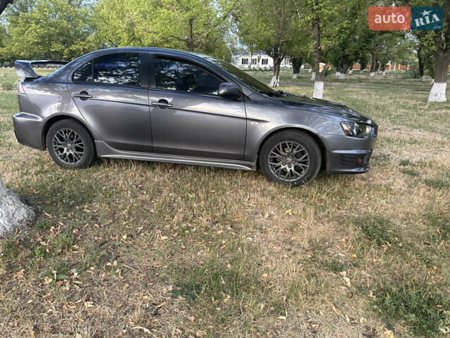 Серый Мицубиси Лансер, объемом двигателя 1.5 л и пробегом 255 тыс. км за 6000 $, фото 7 на Automoto.ua