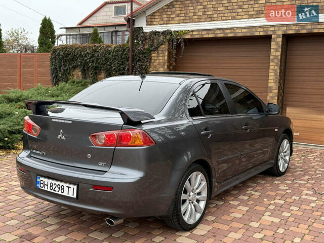 Сірий Міцубісі Lancer, об'ємом двигуна 2 л та пробігом 92 тис. км за 8200 $, фото 54 на Automoto.ua