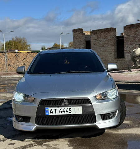 Серый Мицубиси Лансер, объемом двигателя 2 л и пробегом 190 тыс. км за 6900 $, фото 5 на Automoto.ua