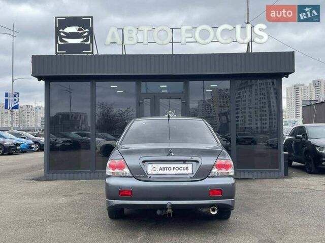 Серый Мицубиси Лансер, объемом двигателя 1.58 л и пробегом 146 тыс. км за 5490 $, фото 6 на Automoto.ua