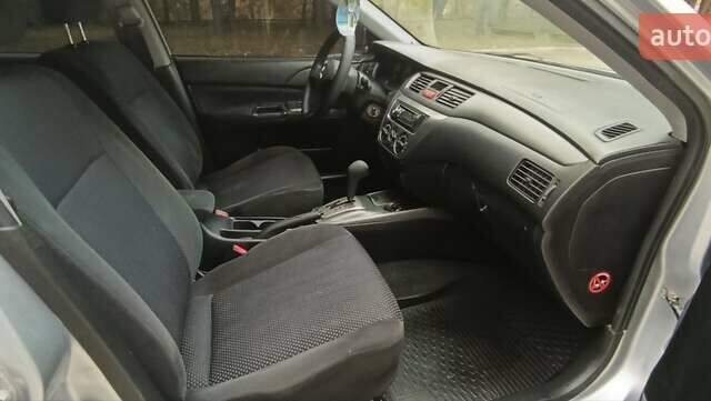 Сірий Міцубісі Lancer, об'ємом двигуна 1.6 л та пробігом 176 тис. км за 4999 $, фото 25 на Automoto.ua