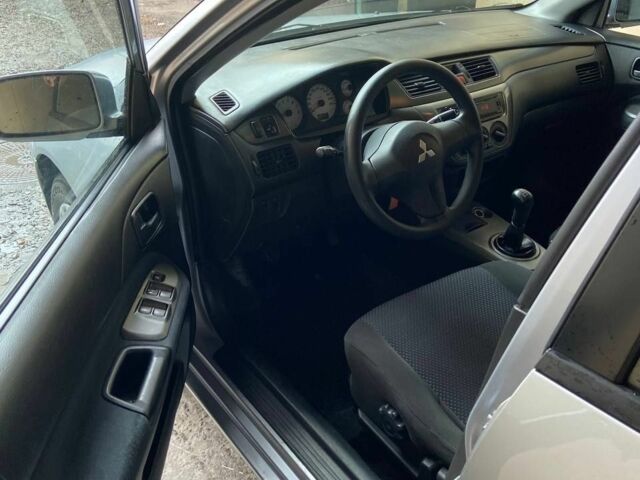 Сірий Міцубісі Lancer, об'ємом двигуна 1.6 л та пробігом 196 тис. км за 4700 $, фото 7 на Automoto.ua