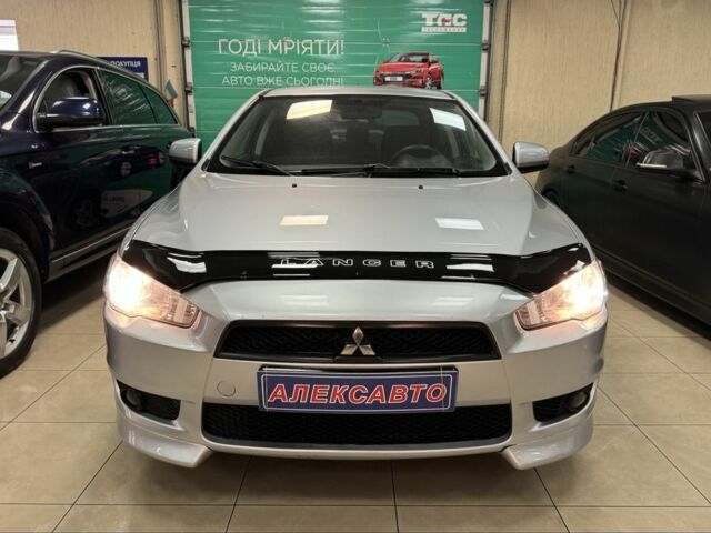 Серый Мицубиси Лансер, объемом двигателя 1.5 л и пробегом 241 тыс. км за 6400 $, фото 6 на Automoto.ua