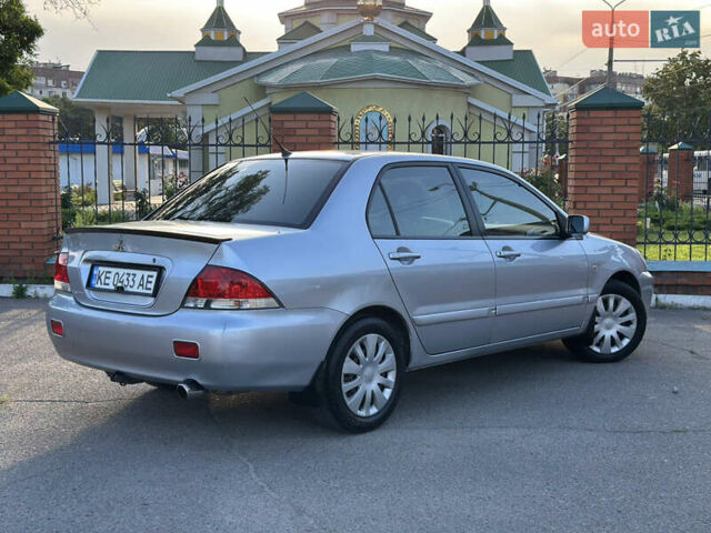 Сірий Міцубісі Lancer, об'ємом двигуна 1.6 л та пробігом 278 тис. км за 3999 $, фото 2 на Automoto.ua