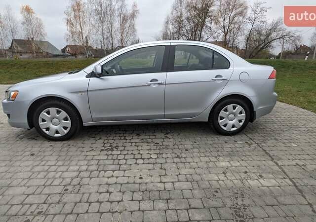 Серый Мицубиси Лансер, объемом двигателя 1.5 л и пробегом 147 тыс. км за 6700 $, фото 4 на Automoto.ua