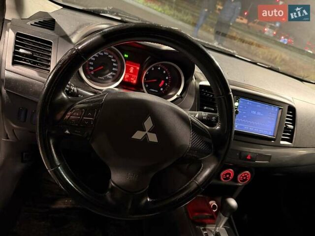 Серый Мицубиси Лансер, объемом двигателя 1.5 л и пробегом 306 тыс. км за 5750 $, фото 6 на Automoto.ua