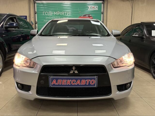 Серый Мицубиси Лансер, объемом двигателя 2 л и пробегом 172 тыс. км за 6300 $, фото 2 на Automoto.ua