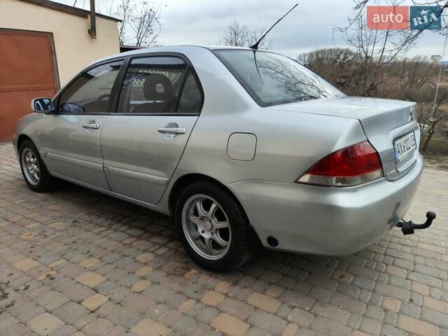 Серый Мицубиси Лансер, объемом двигателя 1.58 л и пробегом 185 тыс. км за 4700 $, фото 17 на Automoto.ua