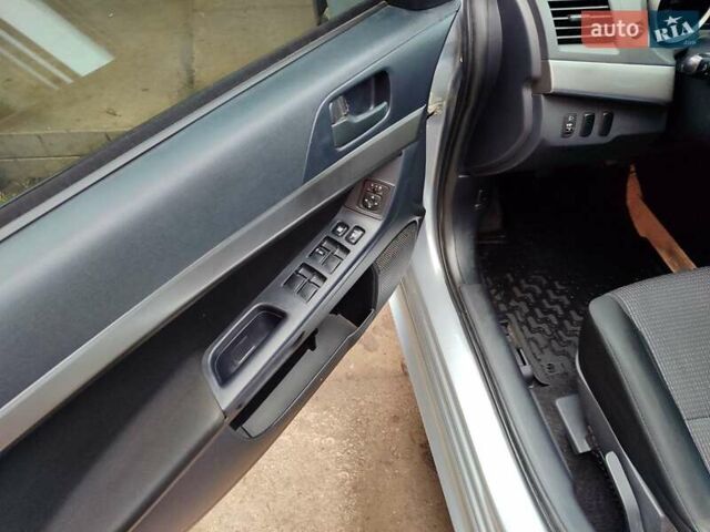 Серый Мицубиси Лансер, объемом двигателя 2 л и пробегом 234 тыс. км за 7200 $, фото 19 на Automoto.ua