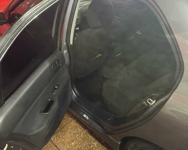 Серый Мицубиси Лансер, объемом двигателя 1.6 л и пробегом 268 тыс. км за 4600 $, фото 8 на Automoto.ua