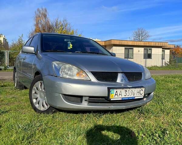 Сірий Міцубісі Lancer, об'ємом двигуна 1.6 л та пробігом 364 тис. км за 4300 $, фото 2 на Automoto.ua