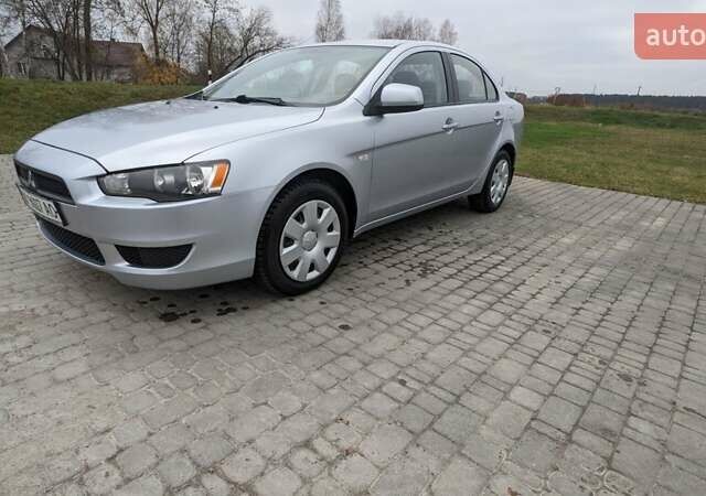 Серый Мицубиси Лансер, объемом двигателя 1.5 л и пробегом 147 тыс. км за 6700 $, фото 3 на Automoto.ua