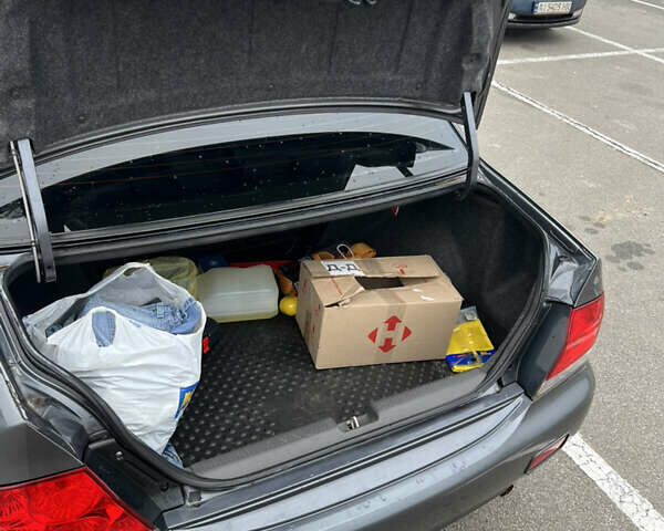 Серый Мицубиси Лансер, объемом двигателя 1.58 л и пробегом 183 тыс. км за 3800 $, фото 24 на Automoto.ua