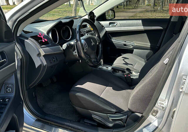 Сірий Міцубісі Lancer, об'ємом двигуна 1.8 л та пробігом 255 тис. км за 6999 $, фото 9 на Automoto.ua