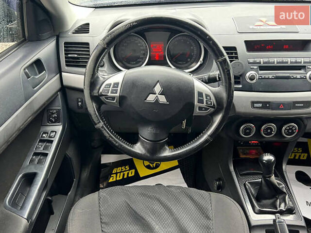 Серый Мицубиси Лансер, объемом двигателя 1.5 л и пробегом 239 тыс. км за 6000 $, фото 6 на Automoto.ua