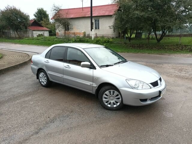 Сірий Міцубісі Lancer, об'ємом двигуна 1.6 л та пробігом 224 тис. км за 3100 $, фото 3 на Automoto.ua