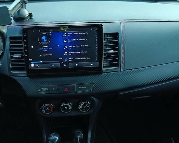 Серый Мицубиси Лансер, объемом двигателя 1.5 л и пробегом 180 тыс. км за 7700 $, фото 24 на Automoto.ua