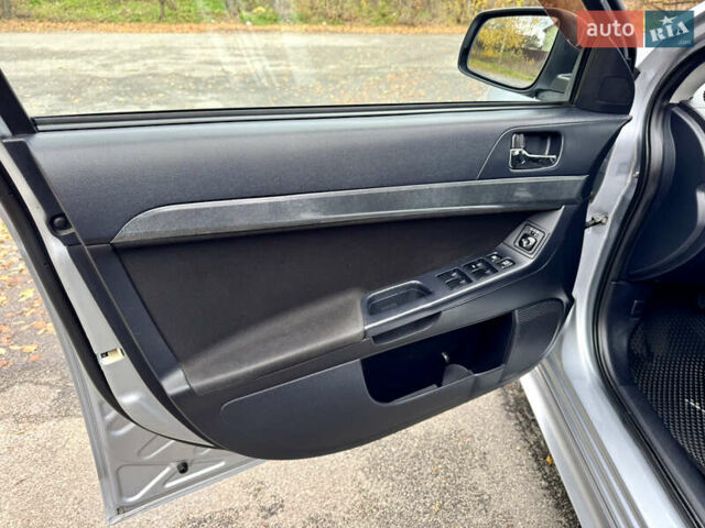 Сірий Міцубісі Lancer, об'ємом двигуна 2 л та пробігом 225 тис. км за 6890 $, фото 10 на Automoto.ua