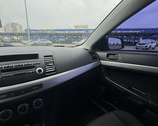 Сірий Міцубісі Lancer, об'ємом двигуна 2 л та пробігом 185 тис. км за 7000 $, фото 15 на Automoto.ua