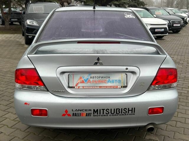 Серый Мицубиси Лансер, объемом двигателя 1.6 л и пробегом 205 тыс. км за 5400 $, фото 5 на Automoto.ua