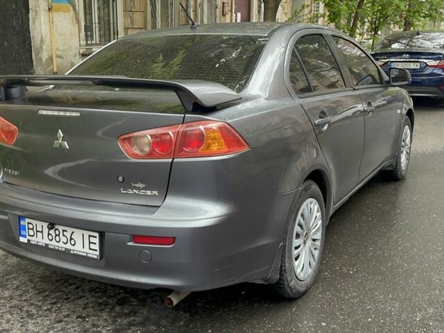 Серый Мицубиси Лансер, объемом двигателя 1.5 л и пробегом 195 тыс. км за 6100 $, фото 3 на Automoto.ua