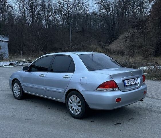 Сірий Міцубісі Lancer, об'ємом двигуна 1.6 л та пробігом 180 тис. км за 3900 $, фото 3 на Automoto.ua