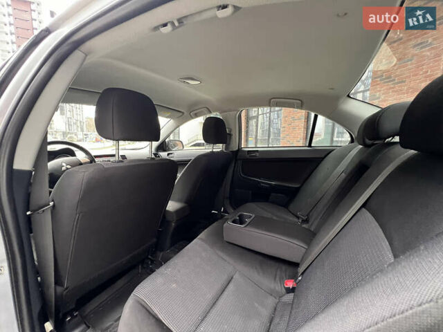 Сірий Міцубісі Lancer, об'ємом двигуна 1.5 л та пробігом 173 тис. км за 4800 $, фото 17 на Automoto.ua