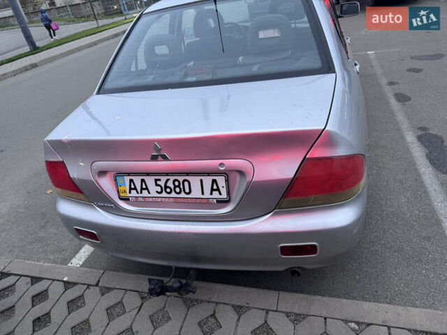 Серый Мицубиси Лансер, объемом двигателя 1.58 л и пробегом 330 тыс. км за 3500 $, фото 19 на Automoto.ua