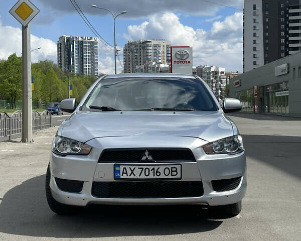 Серый Мицубиси Лансер, объемом двигателя 2 л и пробегом 265 тыс. км за 5500 $, фото 12 на Automoto.ua