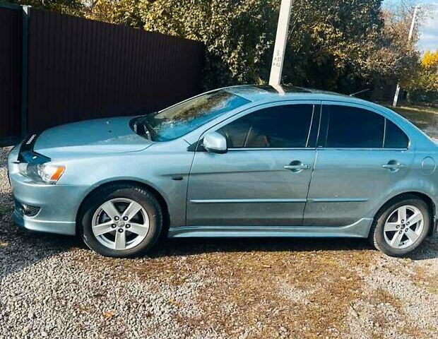 Сірий Міцубісі Lancer, об'ємом двигуна 2 л та пробігом 212 тис. км за 7300 $, фото 8 на Automoto.ua