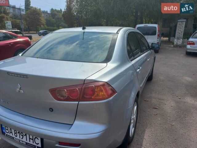 Серый Мицубиси Лансер, объемом двигателя 2 л и пробегом 103 тыс. км за 7700 $, фото 8 на Automoto.ua