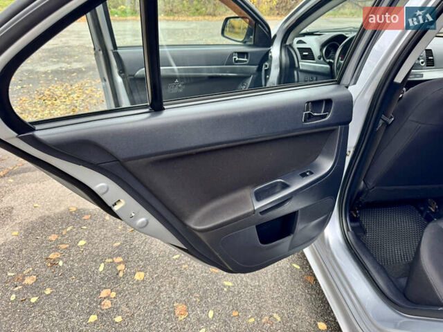 Сірий Міцубісі Lancer, об'ємом двигуна 2 л та пробігом 225 тис. км за 6890 $, фото 12 на Automoto.ua