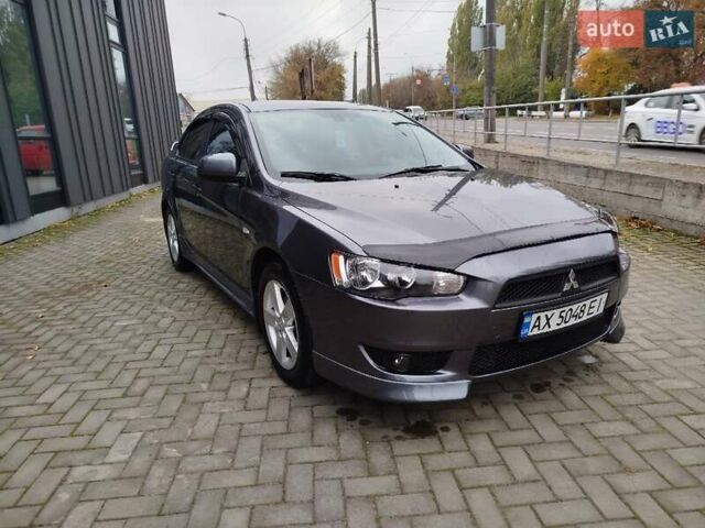 Міцубісі Lancer 2008 у Хмельницькому на Automoto.ua Сірий Міцубісі Lancer, об'ємом двигуна 2 л та пробігом 157 тис. км за 6300 $, фото 15 на Automoto.ua